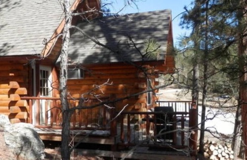 Rapid City Cabin | Custom Built Log Cabin Bordered by Black Hills National Forest