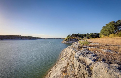 Temple House | Deck and Cliffside Belton Lake Views Temple Retreat