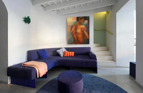Carrion De Los Cespedes Apartment | Design & art, patio with orange tree, near Seville