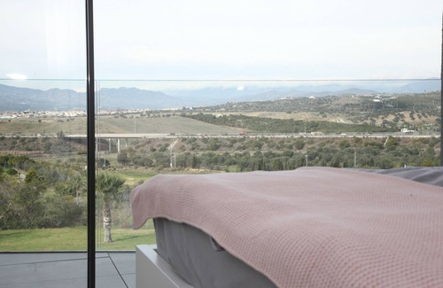 Caleta de Velez House | Designhouse with private pool, right on the golf course