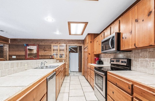 Concan House | Directly ON THE Frio river, with a private pool and room for up to 37!