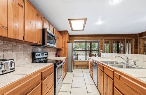 Concan House | Directly ON THE Frio river, with a private pool and room for up to 37!