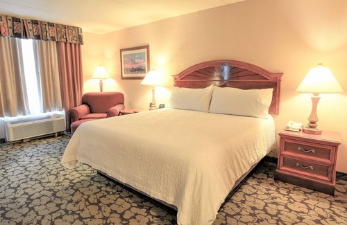 Chinatown Hotel | Discover Modern Comfort at Accommodating Houston Room with Outdoor Pool and Tub