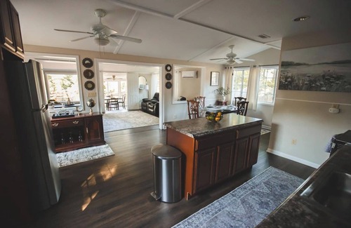 Cave Spring Cabin | Dockside Dreams at Rivers Edge Retreat – 2 bd/1ba Waterfront home on the Coosa River at Lake Weiss (GA/AL line). This updated, newly renovated ranch-style home offers the perfect setting to unplug, recharge and make wonderful lifetime memories!