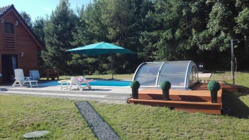 Karwie House | Domek Bagienice z basenem