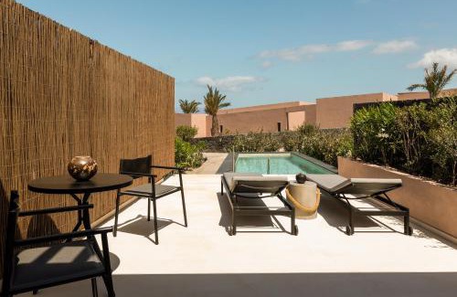 Tholos Hotel | Domes Novos Santorini, Autograph Collection