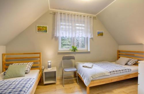 Szczytna House | Domki Brzozowy Zakątek