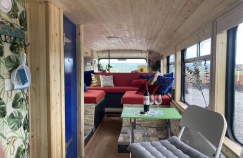 Ballinadee House | Double decker bus and hot tub/bar and patio