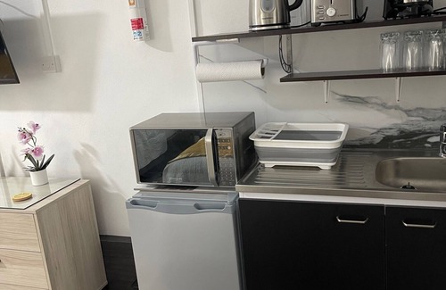 Castle Comfort Apartment | Double Luxury Queen Apt#3 in Roseau with Kitchenette and Gorgeous Bathroom!