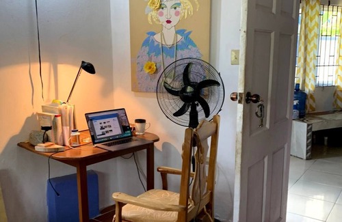 Fairy Hill House | Downstairs Bedroom at Robin Hood guesthouse