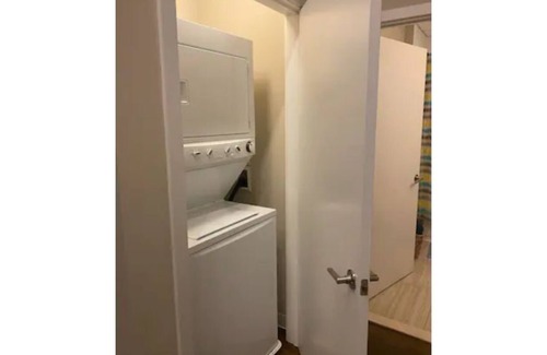 Inner Harbor Condo | Downtowns 1st Skyscaper!Cozy home w/Gym & Parking!