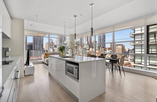 Victoria Park Condo | DT Luxury: Tower View, Near Stampede! FREE Banff Pass, Parking, Wine!