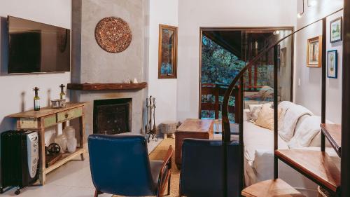 Jardim Europa Apartment | Duplex com lareira e TV Smart em meio à natureza
