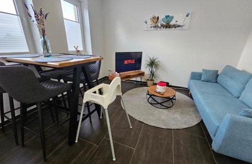 Lingen Apartment | EcoCube Lingen - Balkon, 2Zimmer, Waschmaschine, GästeWC, Backofen