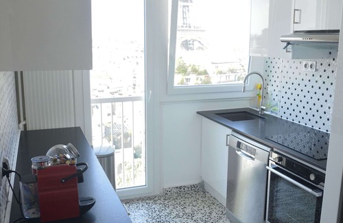Grenelle Apartment | Eiffel Tower views, new luxury designer apartment , sunny, balcony, central A/C