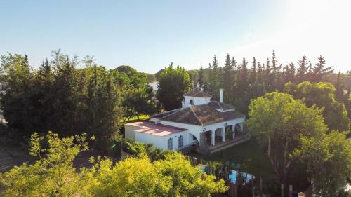 Hinojos Villa | El jardín del botánico