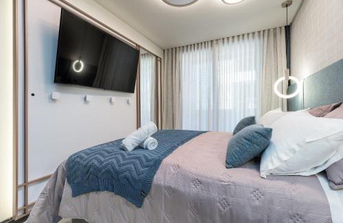 Quinta da Serra Apartment | Elegância e Conforto com Piscina Aquecida by Achei