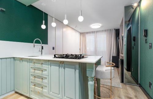 Quinta da Serra Apartment | Elegância e Conforto com Piscina Aquecida by Achei