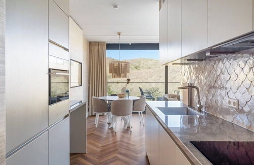 Sint Maartenszee Apartment | Endless enjoyment of luxury and atmosphere with a balcony and dune views