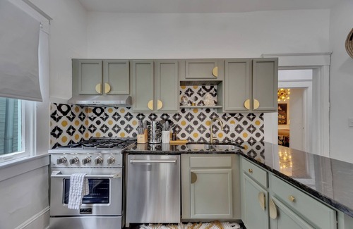 Inman Park Apartment | Enjoy both units of this stylish 5BR/5BA Inman Park duplex—perfect for families, business travelers, and groups. Walkable to top restaurants and the BeltLine. Features 2 kitchens, 3 fireplaces, front porch, pool table & private patios.