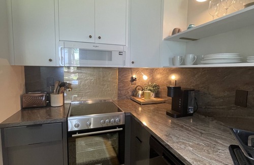 Daphne Apartment | Enjoy Spectacular Sunsets Over Mobile Bay From Your Deck