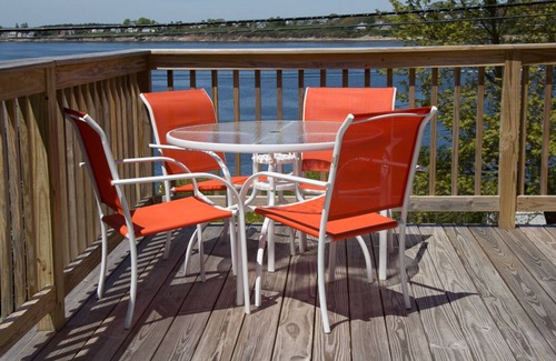 Mid-Coast and Islands House | Enjoy spectacular sunset and water views from the deck and balconies with water access.