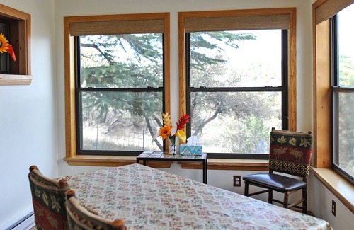 Tyrone Apartment | Enjoy Wildlife from Your Rocking Chair and Swinging Bench on Front Porch