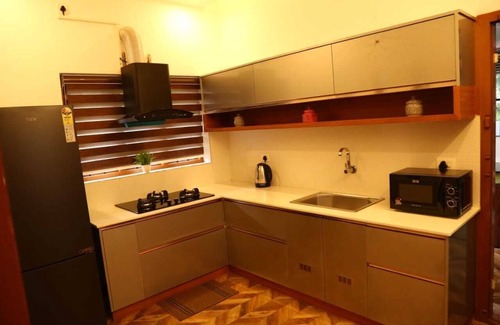 Chengannur Villa | Ethereal Retreatn4-bedroom villa in delightful Chengannur with WiFi, AC