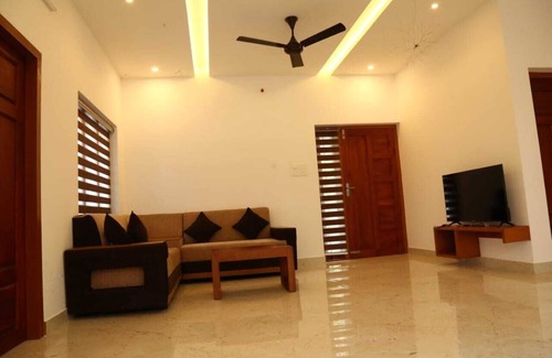 Chengannur Villa | Ethereal Retreatn4-bedroom villa in delightful Chengannur with WiFi, AC