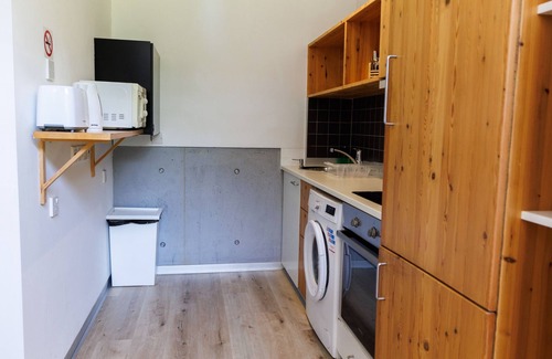 Pentakomo Apartment | Eupraxia | Three-Bedroom Apartment, Art by PraXis Apartments