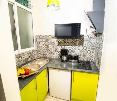 Port-Louis Apartment | Evasion en plein cœur de la ville T2 Jacuzzis Sauna et piscine au centre de Port-Louis