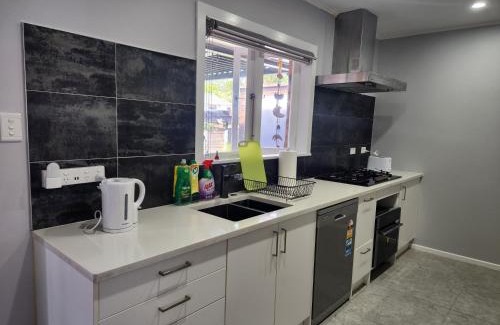 Titirangi Apartment | Experience Comfort in Our 3-Bedroom Family Home