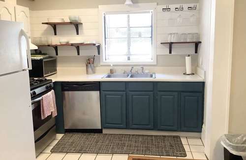 Morningside-Lenox Park Cottage | Experience Midtown Magic: Steps Away from Piedmont Park, Ponce City Market & VA Highlands Dining