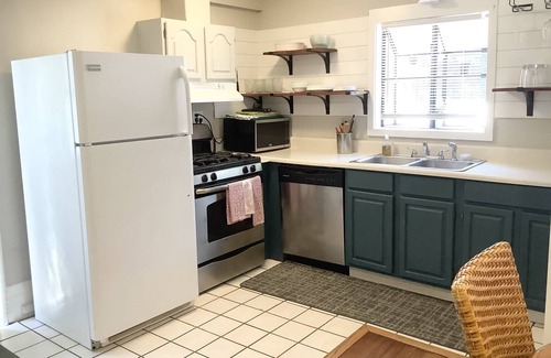 Morningside-Lenox Park Cottage | Experience Midtown Magic: Steps Away from Piedmont Park, Ponce City Market & VA Highlands Dining