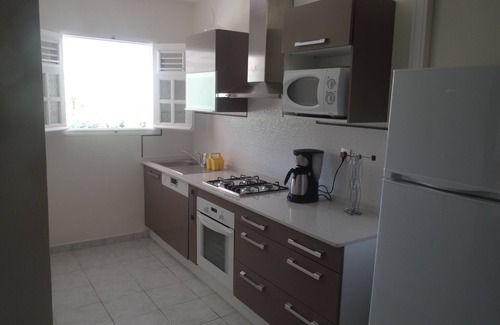 Le Lamentin Apartment | F2 Bottom corner villa with veranda and trees