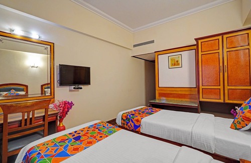 Rajajinagar Hotel | Fabhotel Aura Inn