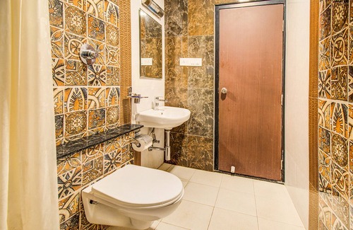 5th Block Hotel | Fabhotel Corporate Crown