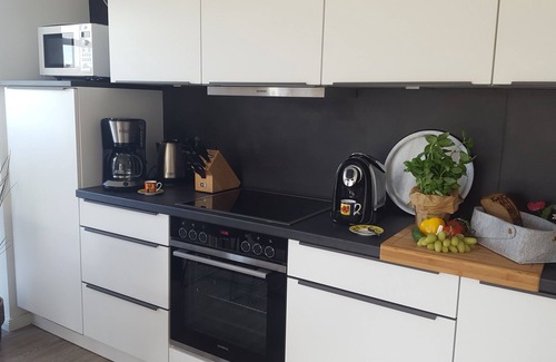 Greetsiel Apartment | Familienfreundliche Erdgeschosswohnung mit Großzügigem Garten und Wasserzugang