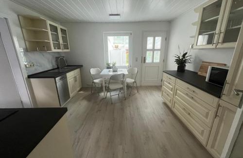 Badow Apartment | Familienfreundliche Ferienwohnung mit Wintergarten