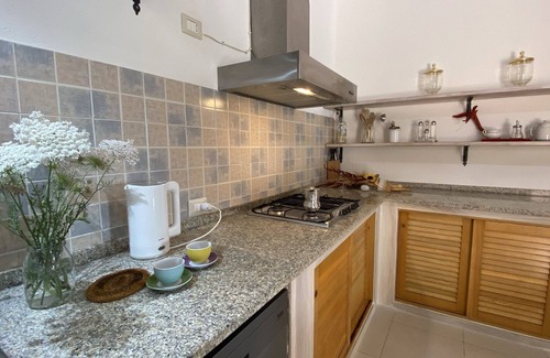 Galtelli Apartment | Family-friendly holiday home nestled in nature with a garden, near the sea