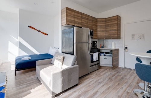 River West Apartment | Feel Comfy And Cozy At This Lovely Chi-town Home Away From Home - 747 Lofts Cabin 308 by RedAwning