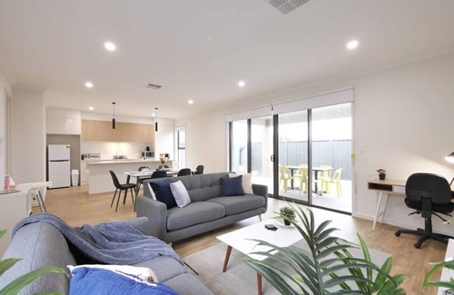 Woodville North House | FEEL HAPPY & AT HOME HERE. No stairs. Modern designer space. Ducted A/C. Double garage.