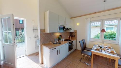 Pelzerhaken House | Feriendorf Südstrand Haus 03