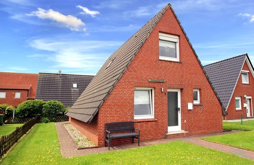 Westeraccumersiel House | Ferienhaus Toms Hutte mit Terrasse in Dornum