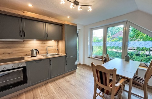 Ihlow Apartment | Ferienhuus up Hütten by Interhome