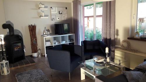 Basedow Apartment | Ferienwohnung am Malchiner See mit Boot und Kanu