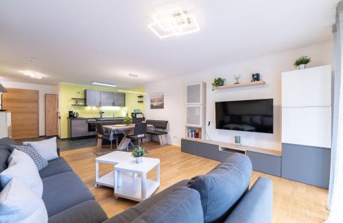 Feldberg House | Ferienwohnung BUTTERBLUME, Feldberg - Haus Wiesenquelle