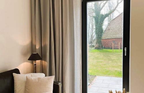 Rysum Apartment | Ferienwohnung Bütz - Vacation in the historic Gulfhof with modern comfort - Van