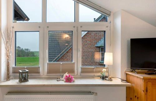 Busumer Deichhausen Apartment | Ferienwohnung Nordseekieker