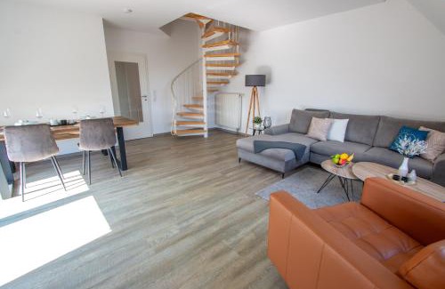 Korbecke Apartment | Ferienwohnung Möhnesee - zentral, stilvoll und ruhig mit Balkon und Boxspringbetten